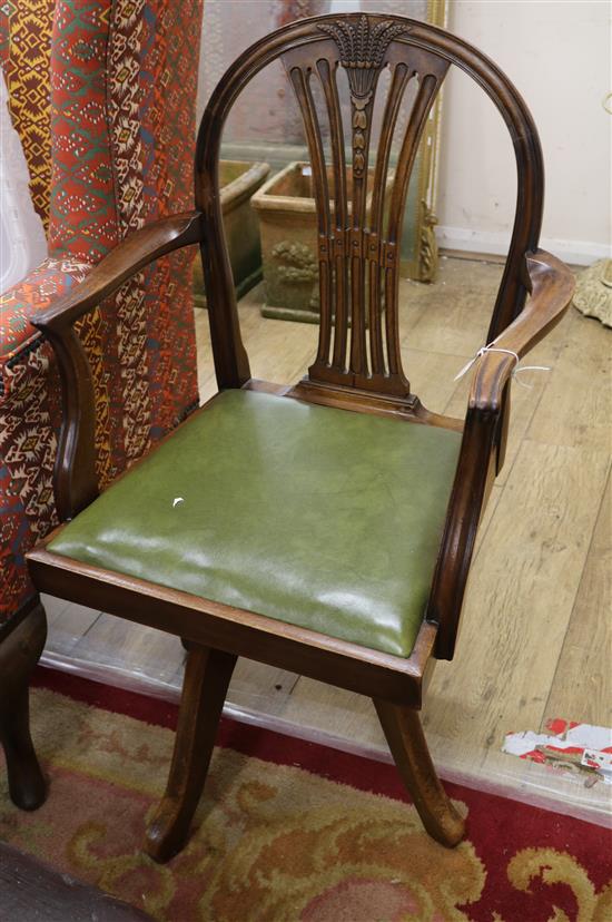 A Hepplewhite-style mahogany swivel desk chair